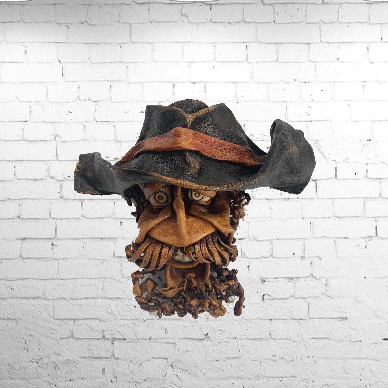https://www.spirithomeinteriors.com/1999-home_default/pirate-moulded-leather-wall-mask.jpg